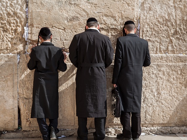 men at wailing wall